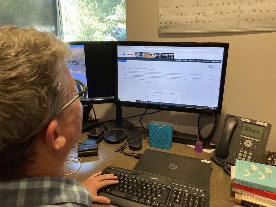 Brett Loeb goes through the steps for signing up and sending out a Pitkin Alert at the Pitkin County Regional Emergency Dispatch Center on July 8. The Everbridge software used by Pitkin County helps Loeb quickly get information to all subscribers.