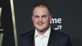 FILE - Zach Bryan arrives at the 58th annual Academy of Country Music Awards on Thursday, May 11, 2023, at the Ford Center in Frisco, Texas. Bryan says he was arrested and jailed briefly in northeastern Oklahoma. According to a post on his account on the social media site X, formerly Twitter, Bryan wrote that he had an incident with the Oklahoma Highway Patrol on Thursday night and said some things that were out of line because he was frustrated. (AP Photo/Jeffrey McWhorter, File)