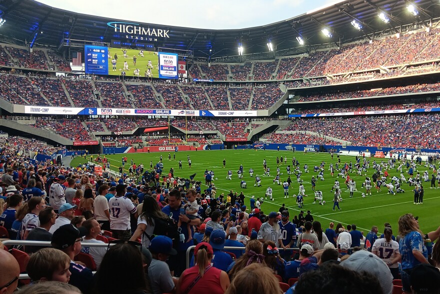 Buffalo Bills players stretch on the field prior to the start of the team's 'Return of the Blue and Red' practice inside Highmark Stadium, Saturday, August 8, 2026.
