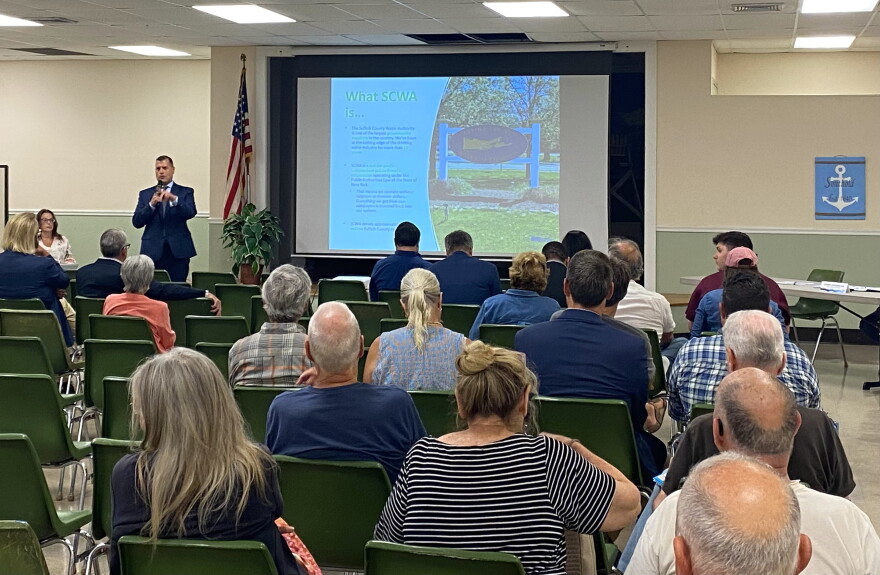Jeff Szabo, CEO of the Suffolk County Water Authority, speaks to an audience of 50 community members and elected officials at the Southold Town Recreation Center on August 20.