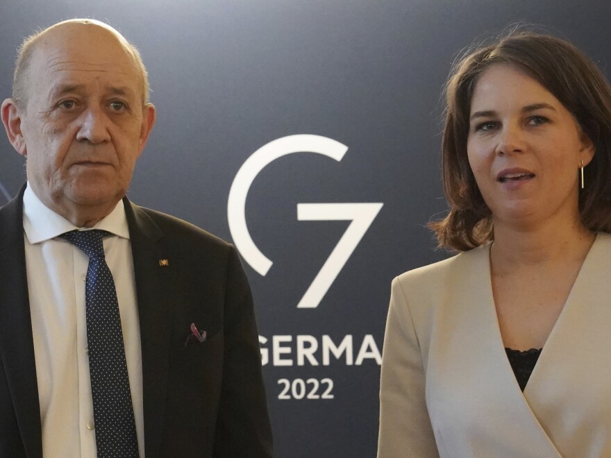 Annalena Baerbock, Foreign Minister of Germany, welcomes Jean-Yves Le Drian, Foreign Minister of France, for bilateral talks at the Schlossgut during the the summit of foreign ministers of the G7 Group of leading democratic economic powers at the Weissenhaus resort in Weissenhaeuser Strand, Germany, Friday, May 13, 2022.