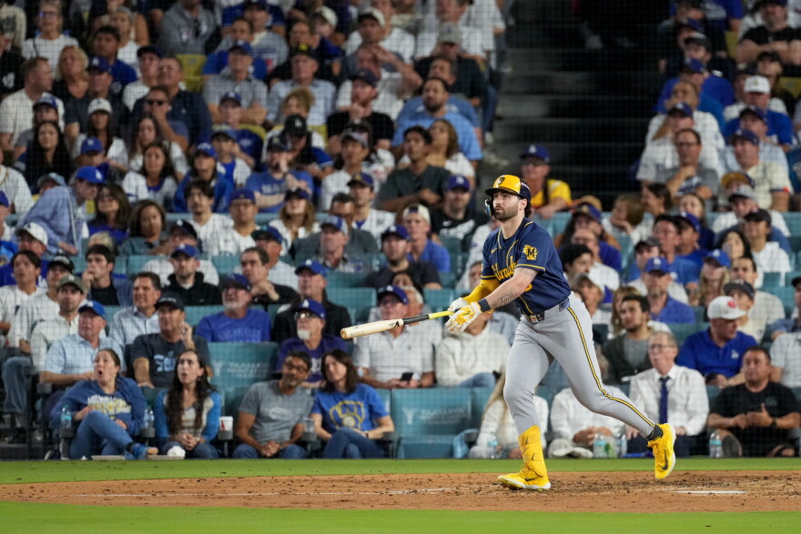 Milwaukee Brewers center fielder Garrett Mitchell follows through on his solo home run during the sixth inning of Game 4 of baseball's National League Championship Series between the Milwaukee Brewers and the Los Angeles Dodgers, Thursday, Oct. 15, 2026, in Los Angeles. (AP Photo/Mark J. Terrill)