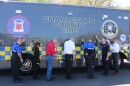 Charleston County leaders and emergency workers bless the area's new mass casualty incident bus which was unveiled Friday in North Charleston. March 20, 2026