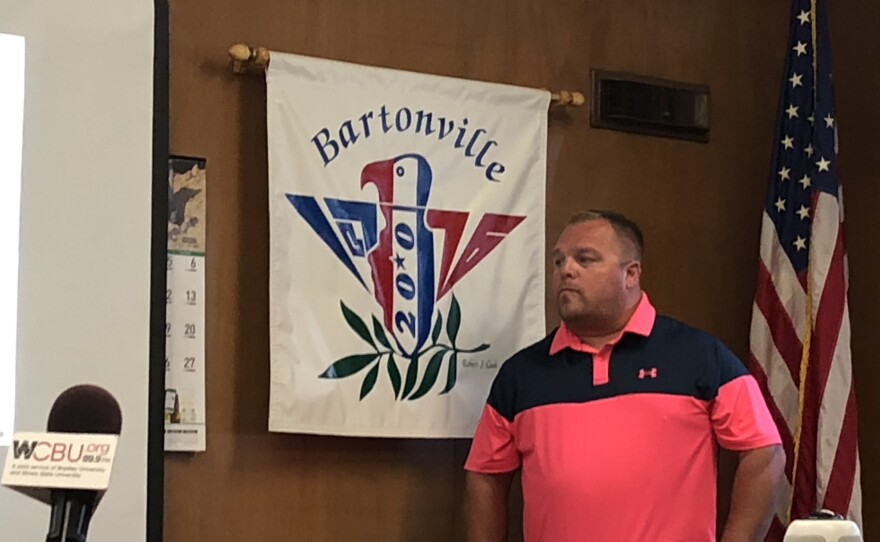 Bartonville volunteer assistant fire chief Drew Zachman makes a public apology for using a racial slur in a video shared on social media during Monday's village board meeting.