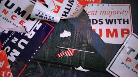 Campaign signs for Republican presidential nominee Donald Trump litter the floor of the room where he celebrated his victory at the New York Hilton Midtown in the early morning hours on Nov. 9, 2016 in New York. (Chip Somodevilla/Getty Images)