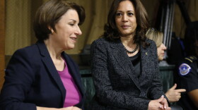 Senators Amy Klobuchar (left) and Kamala Harris talk before the Senate Judiciary Committee hearing with Christine Blasey Ford on Thursday, Sept. 27, 2018. (Michael Reynolds/Pool Image via AP)