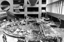 An unidentified man walks through the scattered wreckage in the lobby of Kansas City's Hyatt Regency Hotel on Sunday, July 19, 1981. Two catwalks spanning the lobby crashed onto a crowded dance floor on a Friday night.