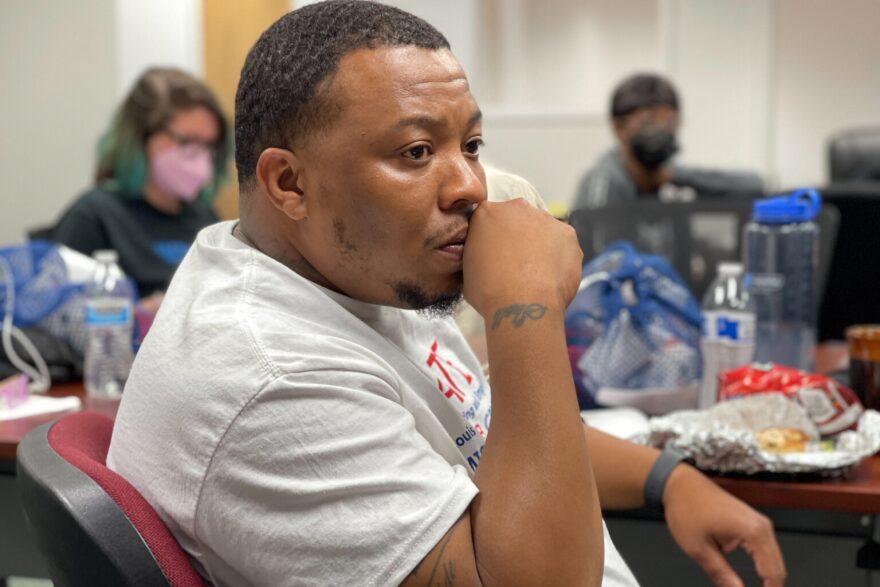 Carlos Ball, a member of the Fatal State Violence Response Team in St. Louis, attends a training on May 28, 2022 at the office of the nonprofit law firm ArchCity Defenders on how to become a crisis responder for officer-involved shooting scenes. Ball’s brother, Cary, was shot and killed by St. Louis police in 2013.