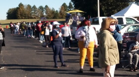 At Anointed Temple of Praise, an early voting location, first day lines stretched down the block. 
