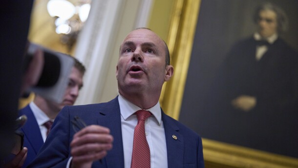 Sen. Mike Lee, R-Utah, speaks to a reporter as senators arrive for votes and policy meetings, at the Capitol in Washington, Tuesday, June 17, 2025. (AP Photo/J. Scott Applewhite)