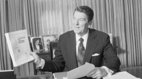 President Reagan holds up the book form of his economic plan, which he presented to Congress on Feb. 18, 1981. In addressing Congress, presidents often present specific policy proposals and plans for the nation.