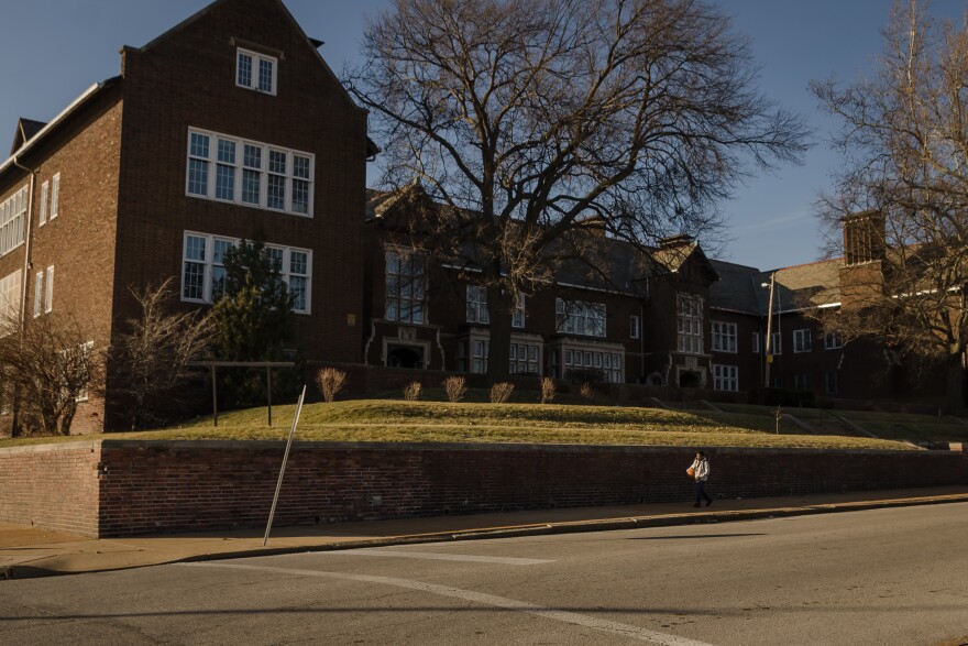 A student leaves Dunbar Elementary School in the JeffVanderLou neighborhood Jan. 9, 2019.