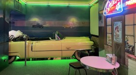 A Cadillac has been converted to a bed