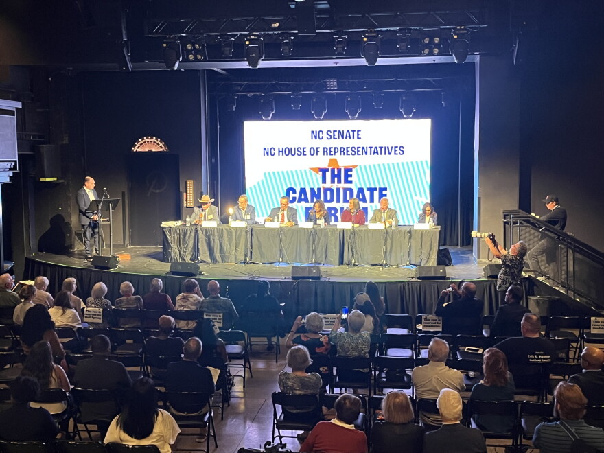 Guilford County candidates answer questions during forum at the Pyrle theater in Greensboro.