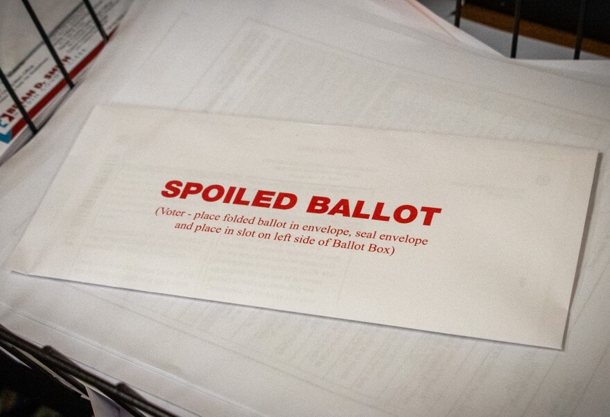 Envelope that says "spoiled ballot"