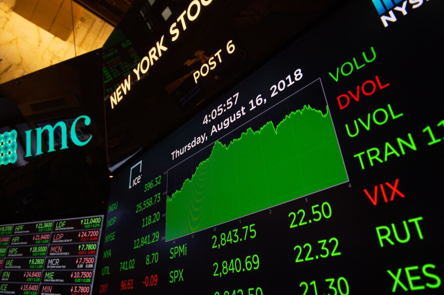 Traders work on the floor at the closing bell of the Dow Industrial Average at the New York Stock Exchange on Aug. 16, 2018 in New York. (Bryan R. Smith/AFP/Getty Images)