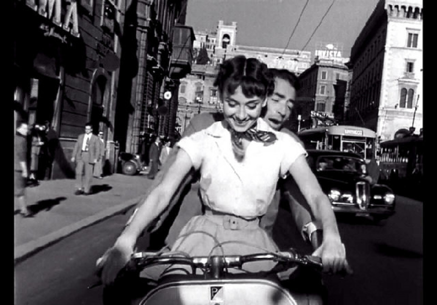 Audrey Hepburn and Gregory Peck in 'Roman Holiday,' a classic vacation movie.