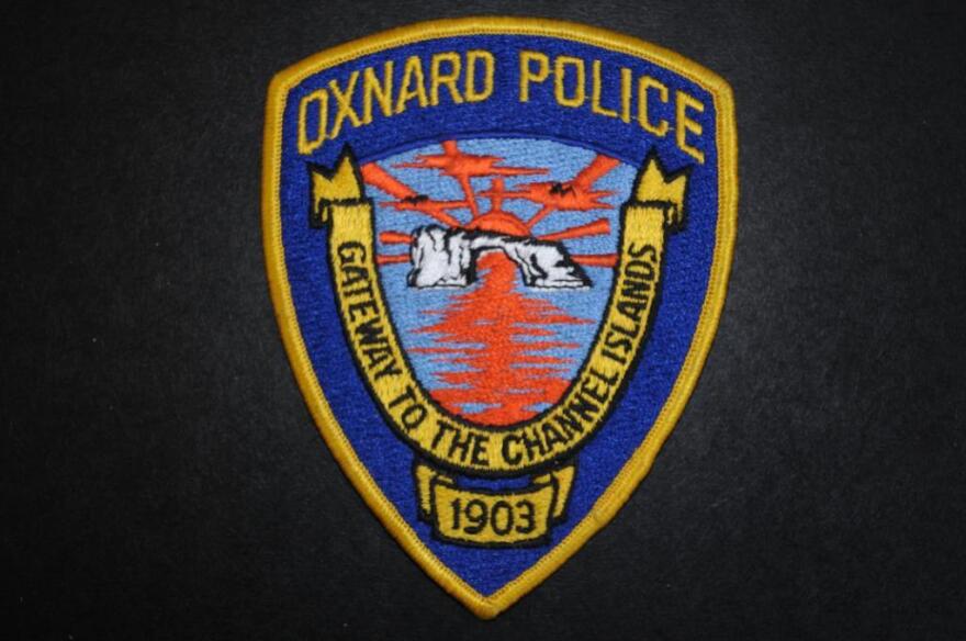 Two cars were hit by gunfire, and one person was wounded at an Oxnard intersection New Year's Eve.