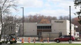  A vehicle drives past the new FirstEnergy facility on the company's West Akron Campus off Mull Avenue on Wednesday, April 10, 2019 in Akron, Ohio. 