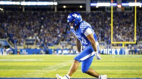 Kentucky running back Chris Rodriguez Jr. celebrates scoring a touchdown against Mississippi State during the second half of an NCAA college football game in Lexington, Ky., Saturday, Oct. 15, 2022. (AP Photo/Michael Clubb)