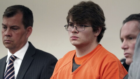 FILE - Payton Gendron, center, listens as he is sentenced, Feb 15, 2023, in Buffalo, N.Y.