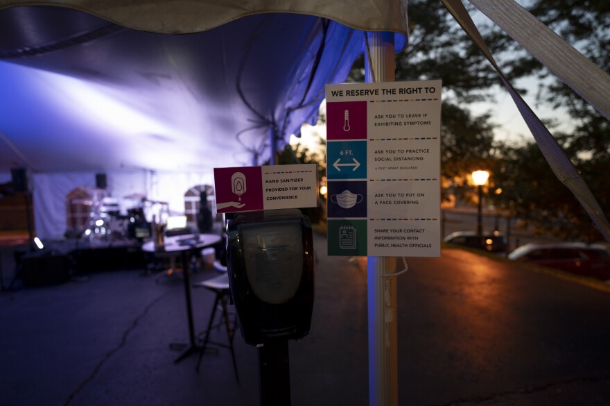 There's hand sanitizer aplenty and audience members must follow new safety rules for live concerts during a pandemic.