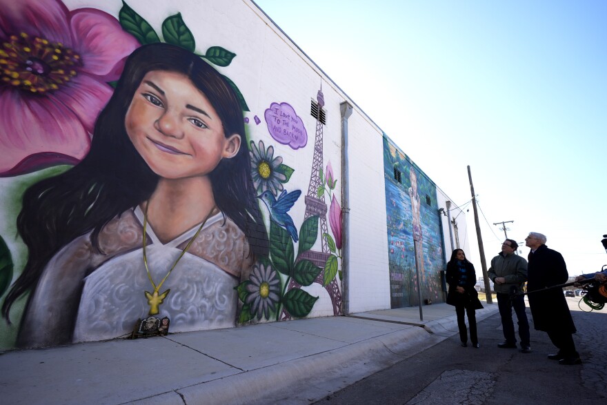 A mural in Uvalde depicts colorful portraits of the students killed in 2022.