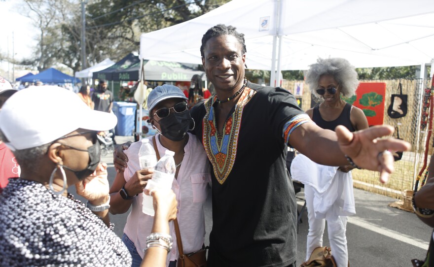 Festival attendees talk during the 2022 Publix Tampa Bay Collard Festival in St. Petersburg, Florida, on Saturday, February 19, 2022. Photo by Octavio Jones for WUSF