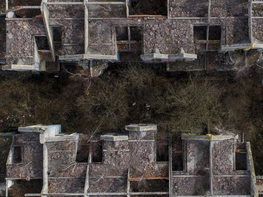 A view of a retirement home devastated during the Bosnian war in the capital Sarajevo, Bosnia, Friday, March 4, 2022.