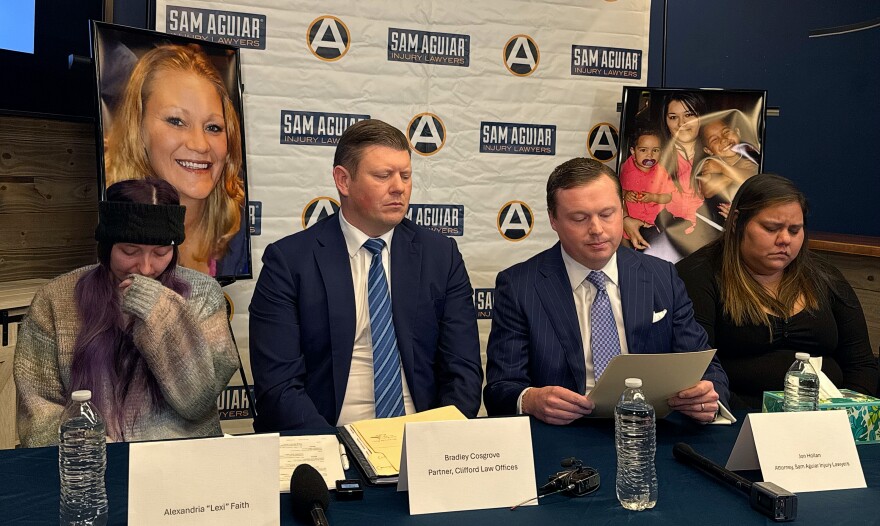 Family members of two of the UPS plane crash victims sit at a table beside their attorneys in Louisville on Dec. 3, 2026. From left: Alexandria Faith