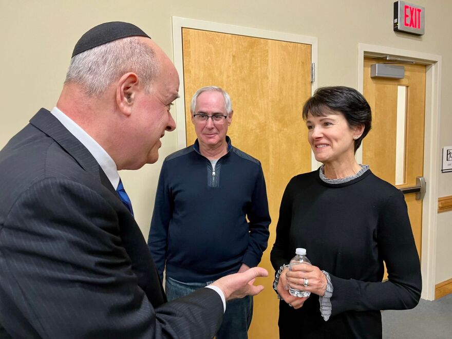 Rabbi David Kaplan, spiritual leader of Congregation Ohav Zedek in Wilkes-Barre, talks with Tree of Life Synagogue shooting survivor Andrea Wedner Monday at the Friedman Jewish Community Center, Kingston, following screening of a documentary about the 2018 attack in Pittsburgh. Listening at left is Wedner's husband, Ron.
