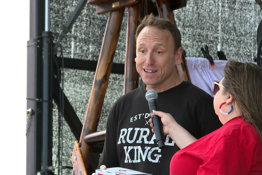 Joey Chestnut speaking to a crown of hundreds in Terre Haute.