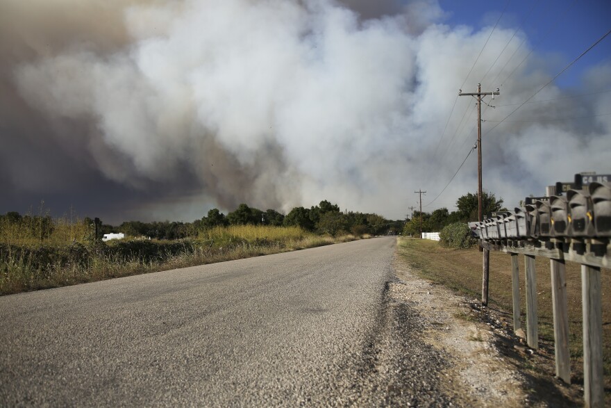 Large plumes of smoke rise from Kellar Road in Smithville in 2015.
