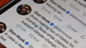 In this photo illustration,  Tweets by Elon Musk are shown on a cell phone in Chicago, Illinois.
