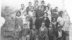 Students at African School #4 posing for a class photo outside of the one-room schoolhouse in 1931.