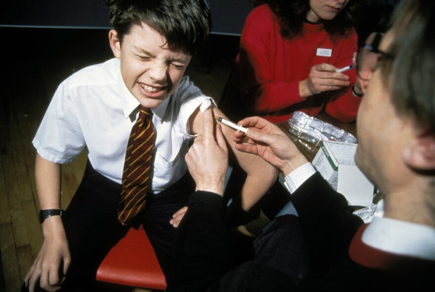 Worth a little pain? Back in 1990, a school boy got a measles shot in the U.K., and it turns out, he got more than protection against the measles.