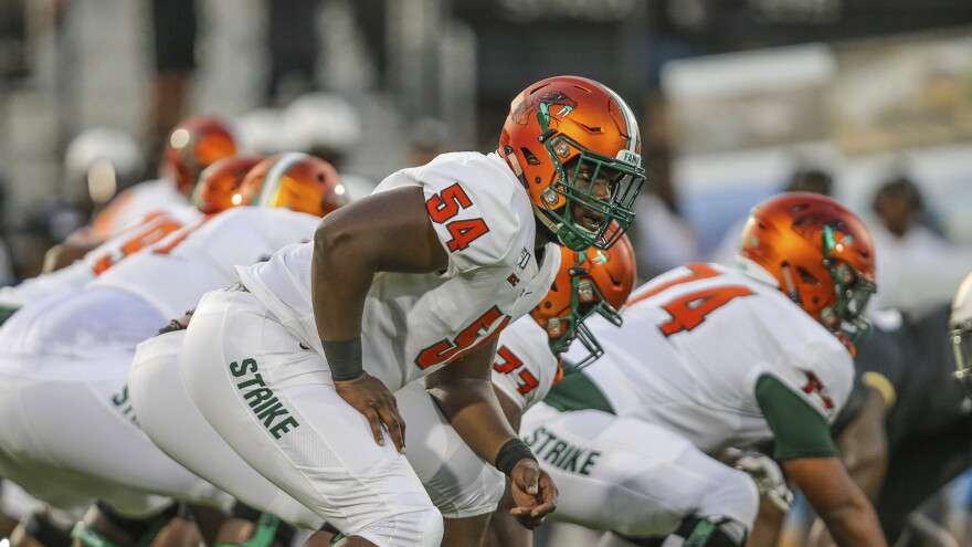 Florida A&M offensive lineman Andre Regis (54) during an NCAA football game against Central Florida on Thursday, Aug. 29, 2019 in Orlando, Fla. (AP Photo/Gary McCullough)