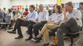 Developers of the Patton Crossing project, (from left) Ara Kervandjian, Bob Poole and Heidi Nicholas, attended the public hearing on Wednesday. The board voted against the rezoning so they could reconsider some details of the zoning guidelines.