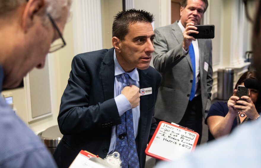 Dallas Woodhouse, executive director of the North Carolina Republican Party, talks with reporters prior to the second day of a public hearing on the investigation into 9th Congressional District voting irregularities.