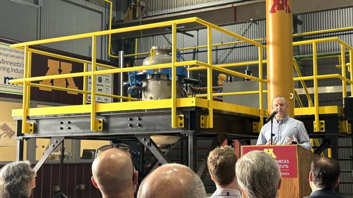 Natural Resources Research Institute Taconite Chair Brett Spigarelli speaks at the direct reduced iron simulator launch on July 27, 2026, in Coleraine.