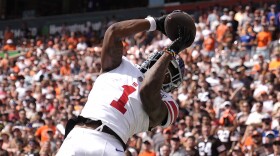 New York Giants wide receiver Malik Nabers (1) catches a touchdown pass against the Cleveland Browns during the first half of an NFL football game, Sunday, Sept. 22, 2024 in Cleveland. (AP Photo/Sue Ogrocki)
