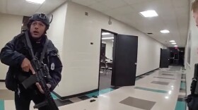 Images captured by body-camera footage show Providence police responding to the scene of a shooting at Brown University on Dec. 13, 2025.