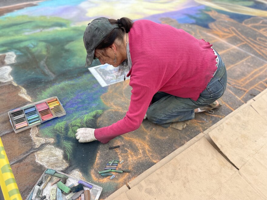 She’s the featured artist for the Street Painting Festival this year but has been creating art as part of the festival for nearly 20 years