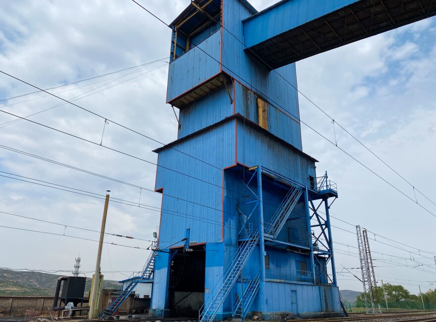 Coal processing equipment at the former Jinhua coal mine. A train once ferried coal from the mine past this tower at least once a day, says train conductor Zhang Puyuan. Since a state merger, the train now runs only once a week or so.