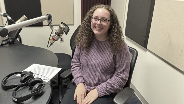 Natalie Harris at the mic in NPR Illinois Studio F.