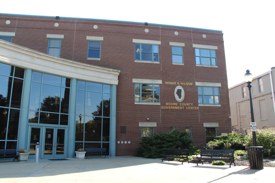 a wide shot of the exterior of the red brick Boone County government building