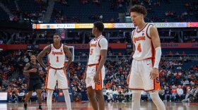 Syracuse players prepare for an out-of-bounds play