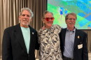 Egyptian Theatre Manager Randy Barton (center) received the 2026 Spirit of Hospitality Award, presented by Myles Rademan (left) and Bob Richer (right), on Sept. 3, 2026.