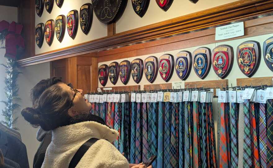 Customers searching through products at Scotland House in Williamsburg.