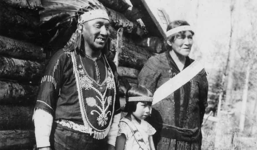 Chief Medicine Man of Chippewa Indians & family. Axel Pasey (Mqy-maush-kow sush) wife and daughter, Helen. Photo taken at Grand Portage, MN (1936)